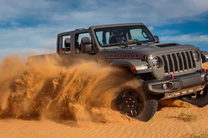 Evening Desert Safari in Dubai — Sunset Dune Bashing, Camel Rides & Premium Camp