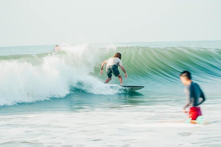 Learn to Surf at Little Buddha Beach, Mui Ne — Sunset Lessons with a Local photo 4