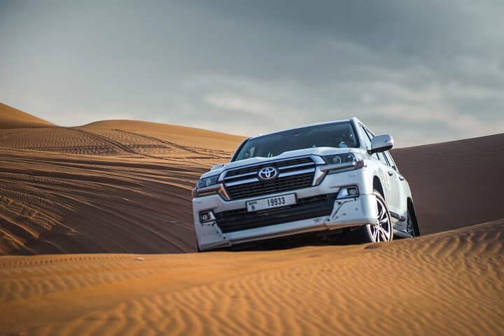 Dubai Red Dune Safari: Evening Dune Bashing, Sandboarding & Bedouin BBQ