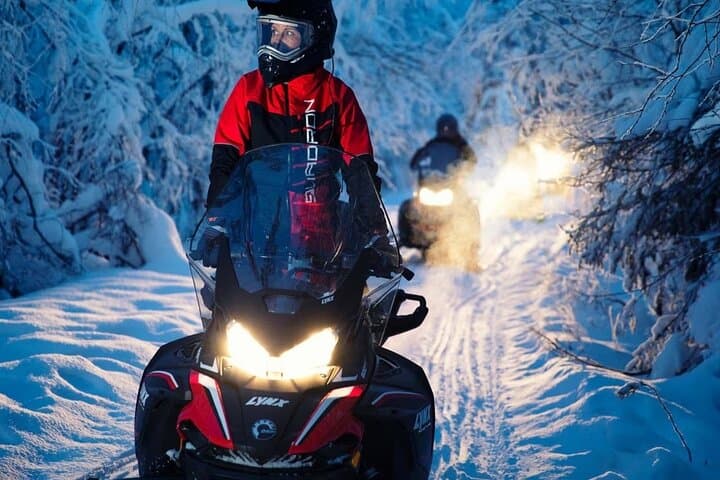 Evening Snowmobile Safari near Rovaniemi — Campfire, Sausages & Northern Lights photo 2