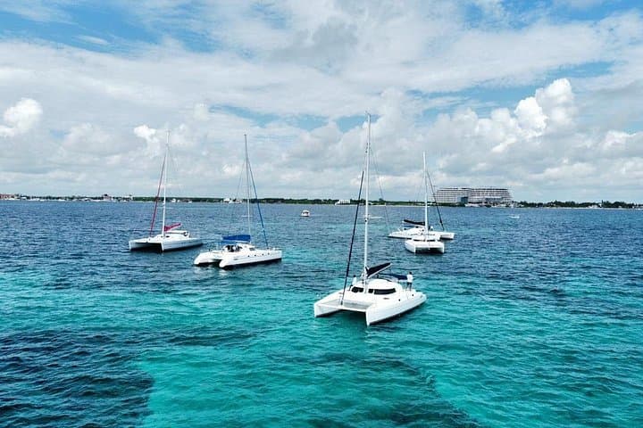 All-Day Isla Mujeres Catamaran Cruise — Snorkel, Open Bar & Ice Bar Experience photo 4
