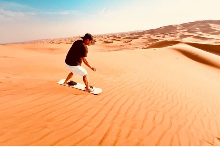 Morning Red Dune Safari in Dubai: Camel, Falcon & Sandboarding at Al Lablab photo 3