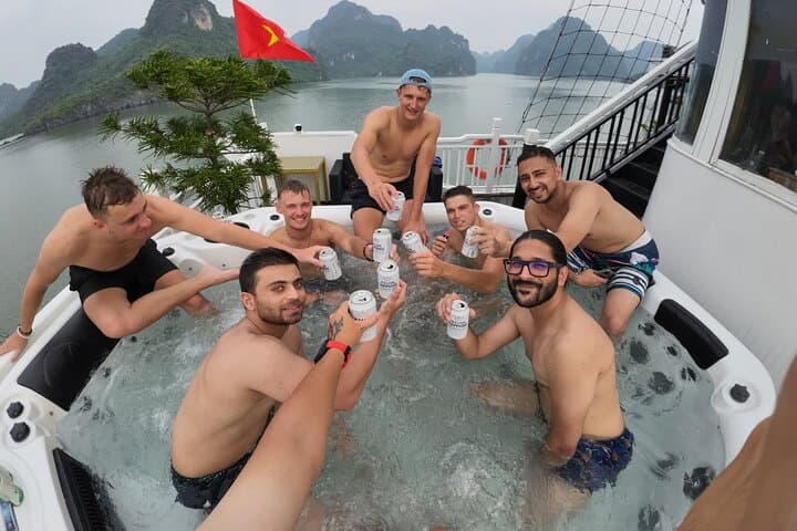 Oasis Bay Party Cruise: Overnight Halong Bay Adventure with Kayaks & Trampoline