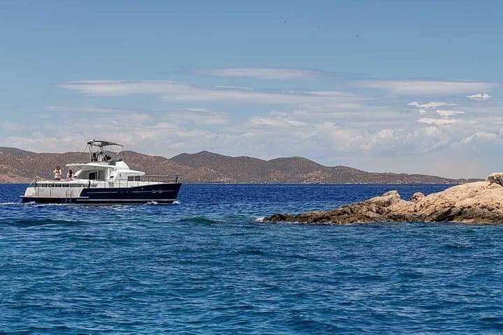Private Half-Day Catamaran Cruise to Kleftiko, Fyriplaka & Gerakas on Milos