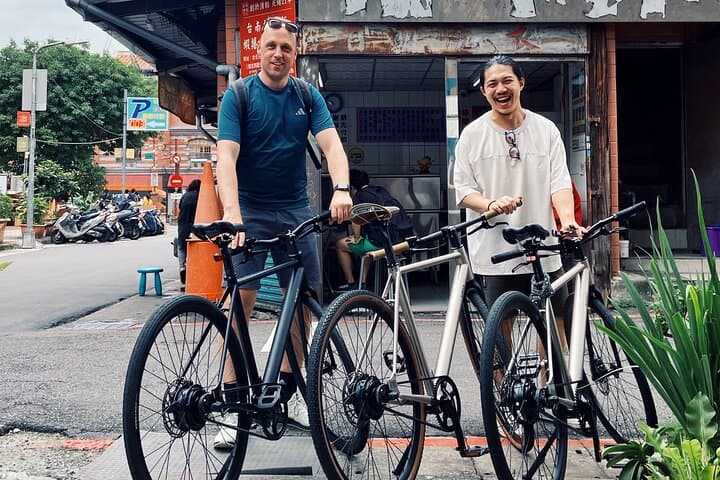 Morning E-bike Tour of Taipei: Ride Through Markets, Temples & Local Eats photo 3