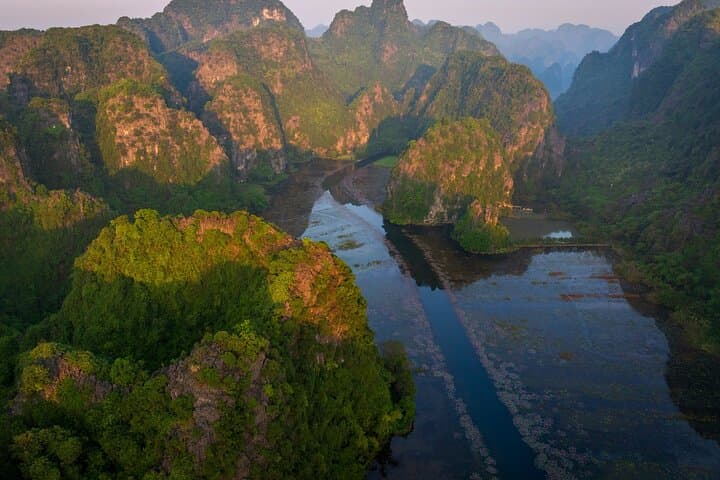 Ninh Binh Day Trip: Cycle Hoa Lu, Boat Through Trang An & Hike Mua Cave photo 3
