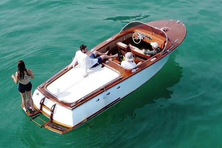 Romantic Wooden Boat Tour on Lake Como — Villas, Waterfalls & Private Cruise photo 1