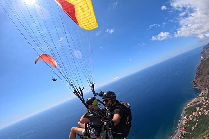 Tandem Paragliding Over Madeira: 30-Min Beach Landing Adventure photo 2