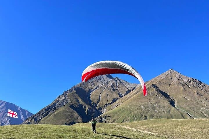 Soar Above the Caucasus: Tandem Paragliding in Gudauri photo 3