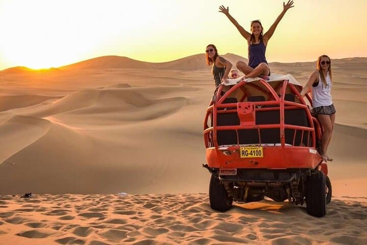 Huacachina Buggy Adventure: Sandboarding and Desert Sunset near Ica