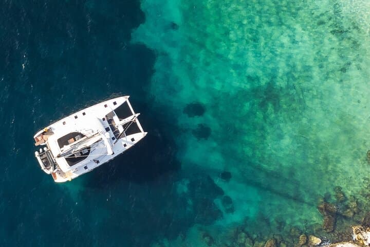 Mykonos Delos Rhenia Day Cruise: BBQ, Snorkeling & Archaeology photo 1