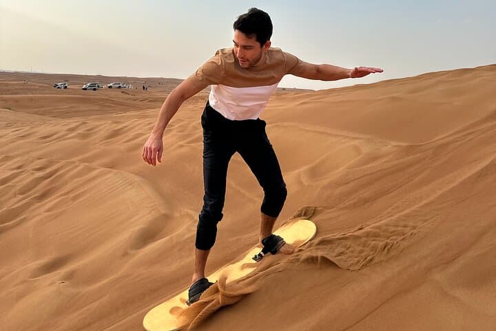 Dubai Evening Desert Safari: Sunset Dune Bashing, BBQ Dinner & Camel Ride photo 4
