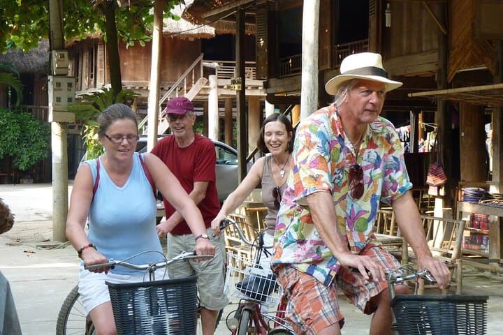 Mai Chau Deluxe Day Tour: Limousine Transfer, Biking & Nhim Cave Exploration photo 2