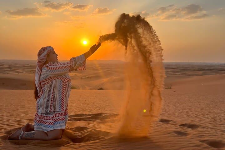 Evening Desert Safari in Abu Dhabi — Camel Ride, Dune Bashing & BBQ Under the Stars