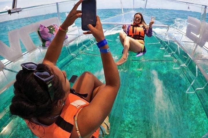 Transparent-Bottom Boat Tour Around Isla Mujeres: Coral Reefs, El Farito & Playa Norte photo 1