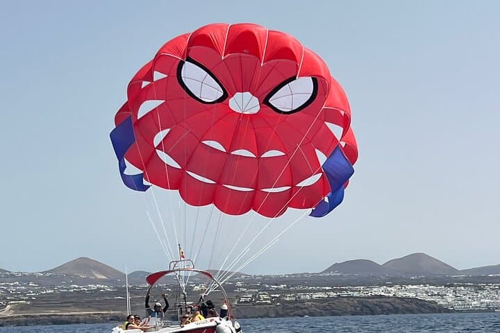 Parasailing in Lanzarote: 10-Minute Coastal Flight Over Volcanic Shores photo 2