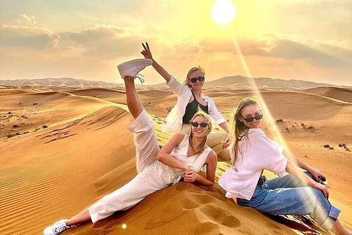 Red Dunes Desert Safari: Dune Bashing, Camel Ride, BBQ & Live Shows photo 2