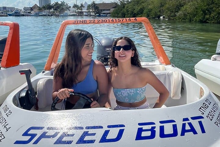 Pilot a Speedboat Through Nichupté Lagoon and Snorkel Punta Nizuc — Cancun Couples Tour