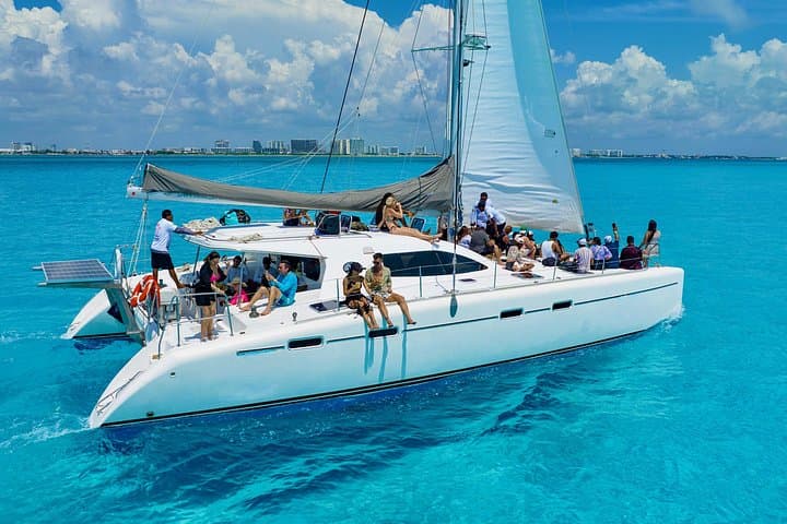 Isla Mujeres Spring Break Catamaran: Snorkel, Open Bar & Beach Club Party photo 2