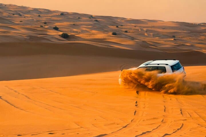 Private Evening Desert Safari Dubai: BBQ, Dune Bashing & Sandboarding photo 2