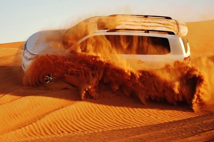 Mid-Day Dubai Desert Safari: Red Dunes, Brunch & Quad Bike Options photo 1