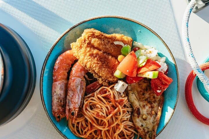 Santorini Catamaran Cruise: Luxury BBQ, Open Bar & Snorkeling the Caldera photo 5