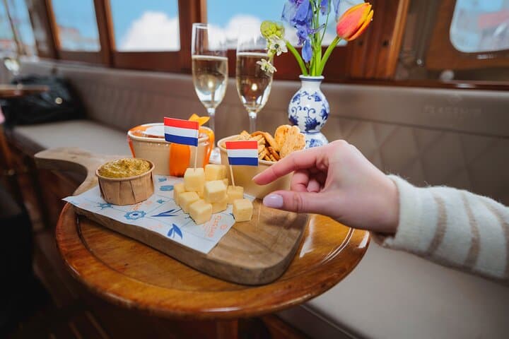 Amsterdam Canal Cruise with Unlimited Bubbles & Bites — Romantic 1-Hour UNESCO Cruise photo 2