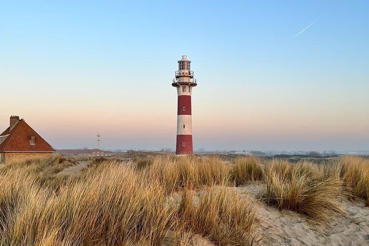 Sunset Walk at Nieuwpoort Coast — Coastal History, Wildlife & Local Tastes