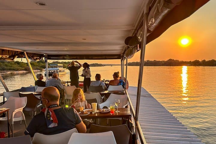 Victoria Falls Bridge, Rainforest Walk & Zambezi Sunset Cruise — No Fly Zone Day Tour photo 3