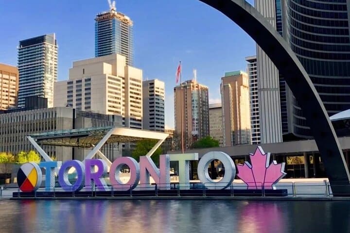 Toronto City Tour: Distillery District, St. Lawrence Market & CN Tower Highlights