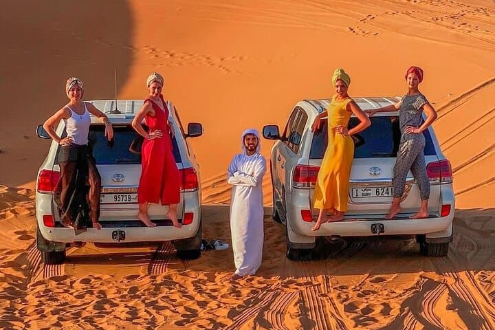 Sunset Desert Safari in Dubai: Dune Bashing, BBQ & Live Shows photo 4