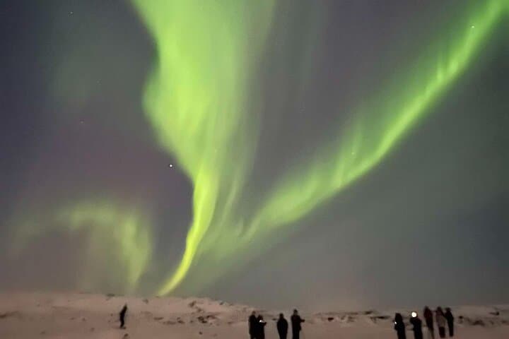 Chasing the Arctic Sky: Reykjavik Northern Lights Tour (3-Hour Aurora Hunt) photo 2