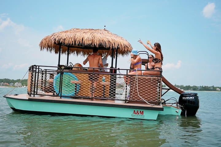 Destin Tiki Castaway 1.5-Hour Harbor Cruise with Waterslide and Swim Stop photo 1