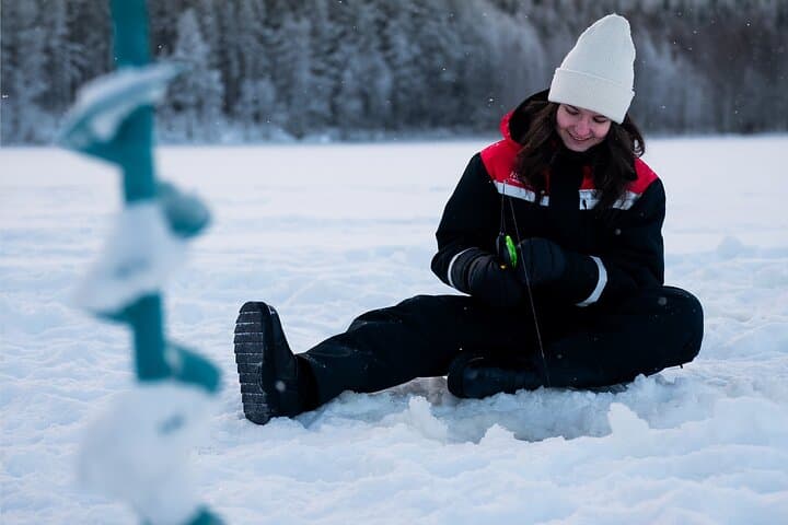 Arctic Day: Ice Fishing & Ice Floating Near Rovaniemi photo 3