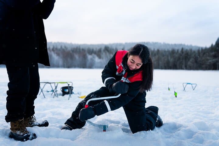 Snowmobile and Ice Fishing Experience in Rovaniemi, Lapland photo 3