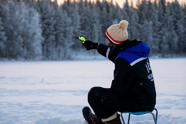 Arctic Day: Ice Fishing & Ice Floating Near Rovaniemi photo 5