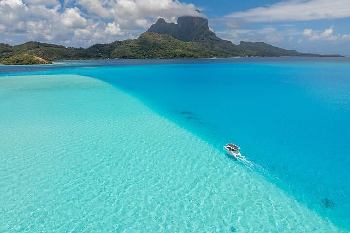 Solar Catamaran Through Bora Bora’s Lagoon — Private Electric Boat Rental