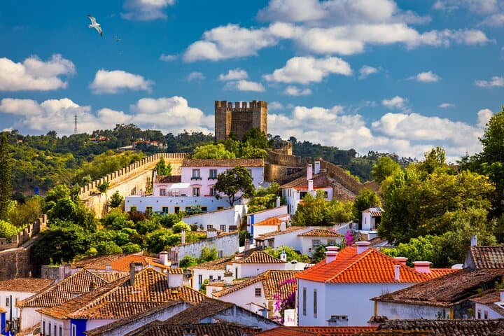 Private Day Trip to Fátima, Nazaré & Óbidos from Lisbon — Pilgrimage, Cliffs & Medieval Streets photo 2