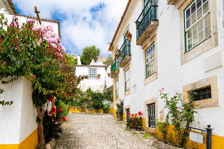 Private Day Trip to Fátima, Nazaré & Óbidos from Lisbon — Pilgrimage, Cliffs & Medieval Streets photo 4