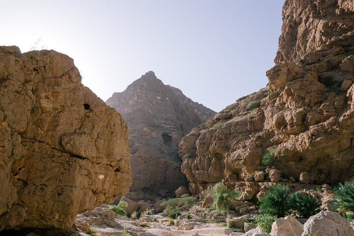 Oman Coastal Day Adventure: Wadi Shab Hike, Bimmah Sinkhole, White Beach and Bibi Maryam photo 3