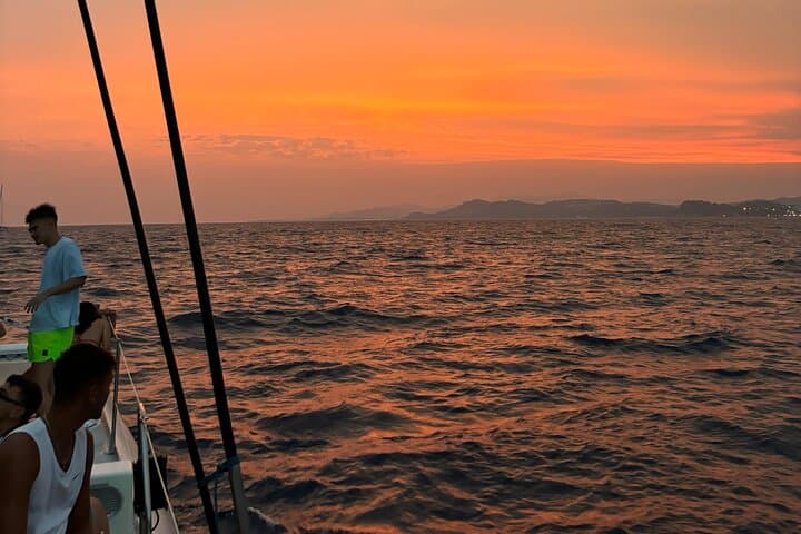 Sunset Catamaran Party in Lloret de Mar: DJ, Drinks & Swim on the Costa Brava photo 6