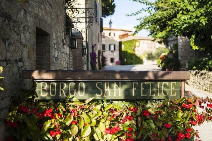 Helicopter Wine Tour to Borgo San Felice from Florence — Chianti Flight & Tasting photo 1