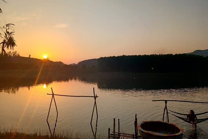 Phong Nha Sunset Cycling: Village Ride, Boat Crossing & Sunset Swim photo 1