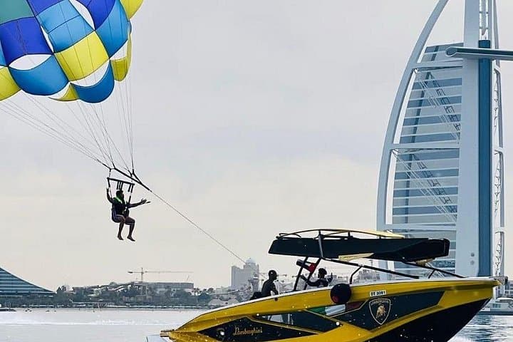 Parasailing Over Dubai Marina: Fly Past Burj Al Arab and Ain Dubai photo 1