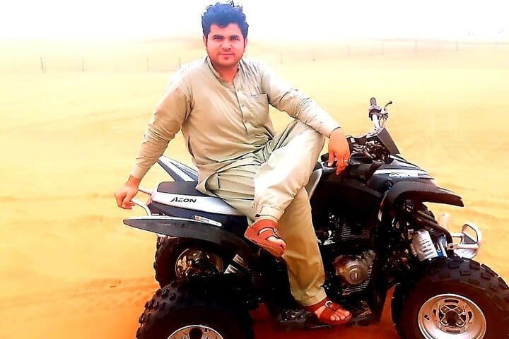 Big Red Dune Quad Biking Near Dubai: Camel Ride & Sandboarding Adventure photo 4