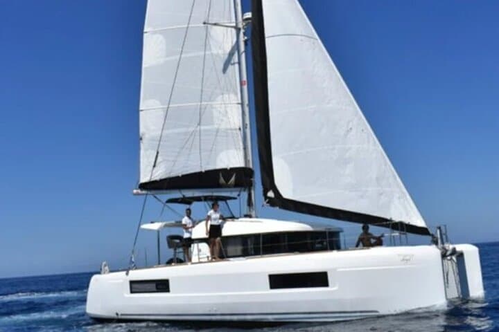 Santorini Full-Day Catamaran to Ios — Red Beach, Volcano & Sunset Cruise photo 2