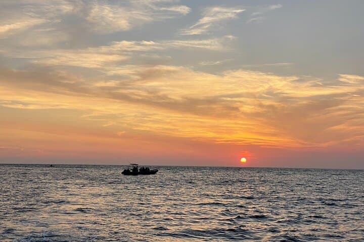Calvi Aperitif Sunset Cruise: Revellata Swim & Wine at Dusk