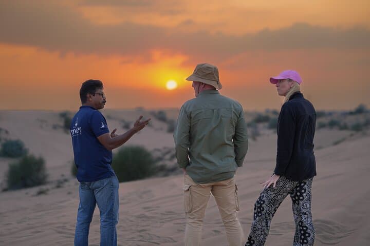 Dubai Red Dune Sunset Safari — Sandboarding, Dune Bashing & Camel Ride Experience