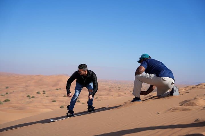 Red Dunes Quad Bike Adventure with Sandboarding, Camel Ride & BBQ in Dubai photo 4