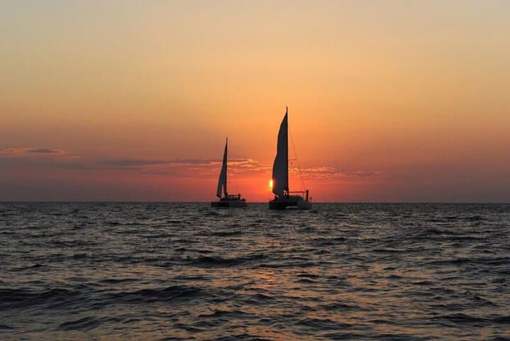 Santorini Full-Day Catamaran to Ios — Red Beach, Volcano & Sunset Cruise photo 4
